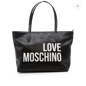A LOVE MOSCHINO bag used a FEW times with slight water Stains not noticeable